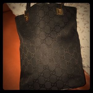Authentic Black Gucci GG with gold hardware